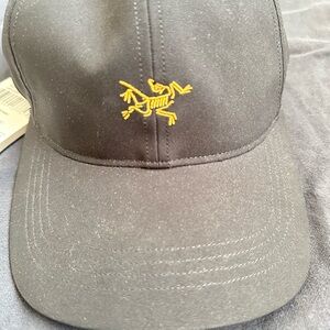 Arc'teryx Black and Yellow Hat with Embroidered Logo
